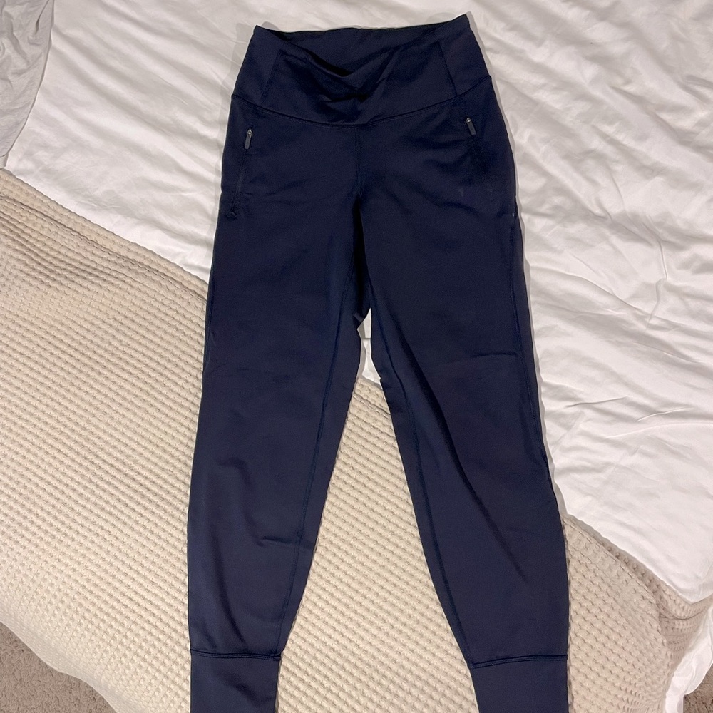 Lululemon Jogger. Size 4. Navy Blue. Cute pocket designs.